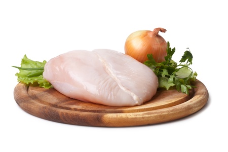 Fresh raw chicken fillets isolated on white backgroundの写真素材