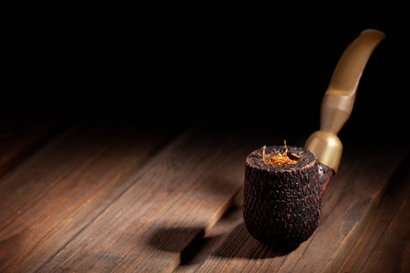 Wooden Pipe and Tobacco