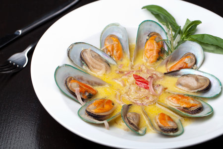 mussels cooked in white sauceの写真素材