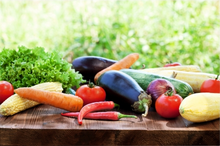 Fresh vegetable on a wooden tableの写真素材