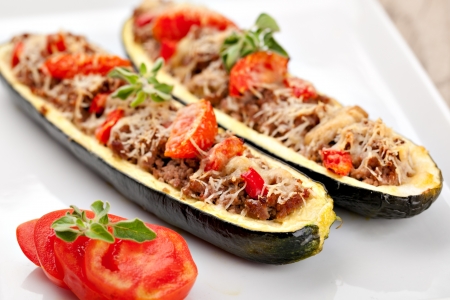 Zucchini halves stuffed with minced meat and vegetableの写真素材
