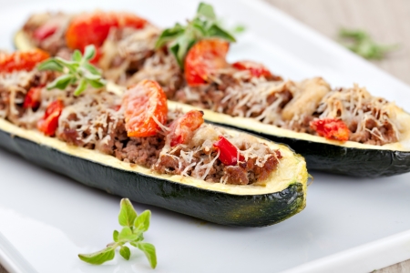 Zucchini halves stuffed with minced meat and vegetableの写真素材