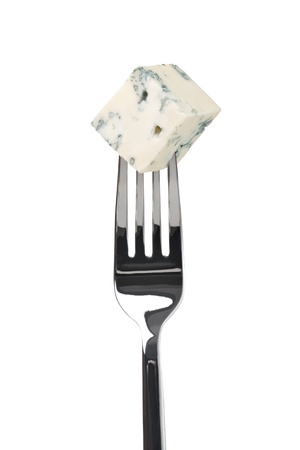 cheese roquefort on a fork. Isolated on a white backgroundの写真素材