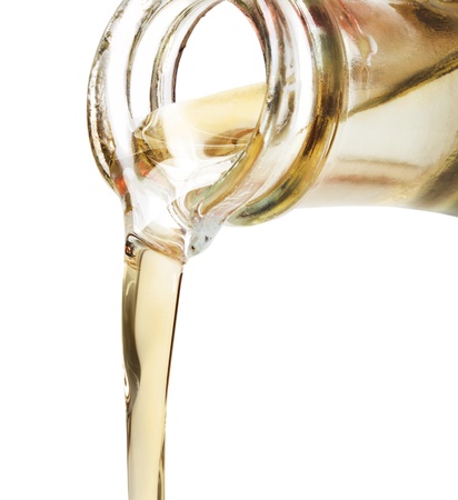 pour olive oil on a white backgroundの写真素材