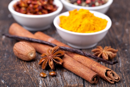 Spice collection on a wooden tableの写真素材