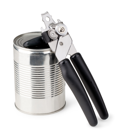 Tin opener opening a can of food isolated on whiteの写真素材