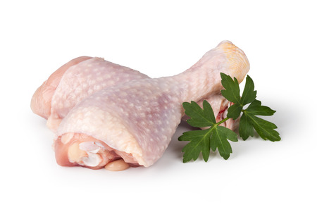 Pieces of raw chicken meat on a white backgroundの写真素材