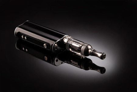 big electronic cigarettes isolated on blackの写真素材