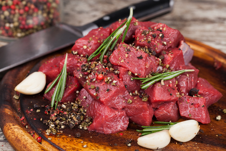 Raw beef meat on a cutting boardの写真素材