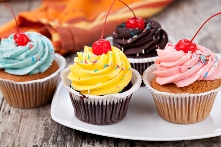 Cupcake on a wooden tableの写真素材