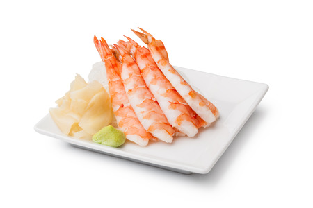 shrimp sashimi with withe plate isolated on white backgroundの写真素材