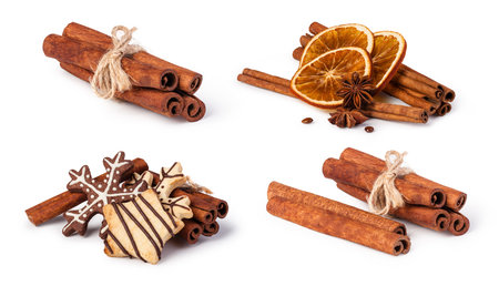 dried oranges and cinnamon isolated on white background