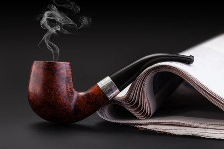 Smoking pipe on a blackの写真素材