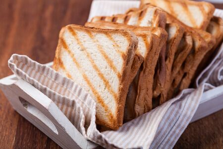 toasted bread, on a woodenの写真素材