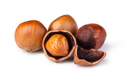 Closeup view of hazelnuts isolated on white backgroundの写真素材