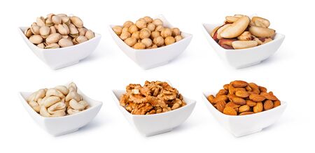 Nuts collection isolated on a white backgroundの写真素材
