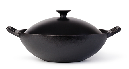 iron wok isolated on white backgroundの写真素材