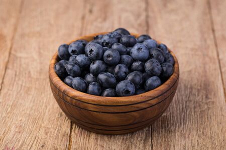Blueberry on a wooden tableの写真素材