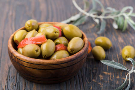 Olives on a wooden backgroundの写真素材