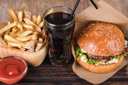 fresh tasty burger on wood tableの写真素材