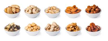 Nuts collection isolated on a white backgroundの写真素材