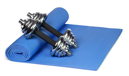 Yoga mat and dumbbells Isolated on white backgroundの写真素材