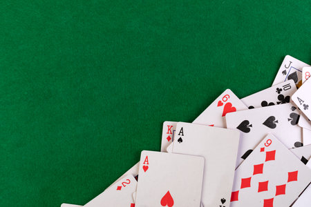 playing cards on green table