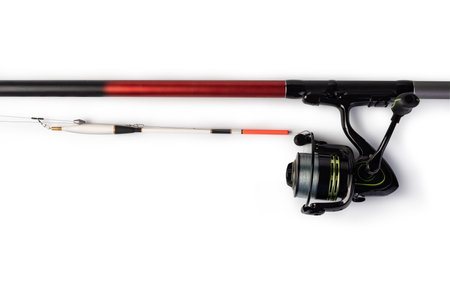 Fishing rod and reel isolated on white background