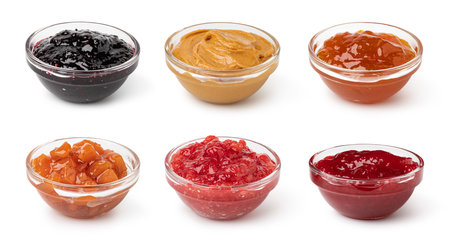 set of glass bowl with jam isolated on white backgroundの写真素材