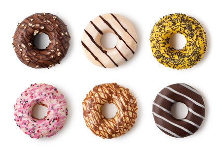 Donuts set with colorful sprinkles isolated on white background. Top view.の写真素材