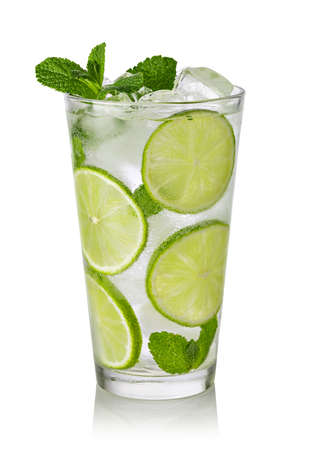 Fresh Mojito cocktail with lime, mint and ice isolated on white backgroundの写真素材