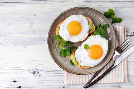 toast with fried egg, top viewの写真素材