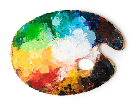 art palette with colorful mixed paints isolated over white backgroundの写真素材