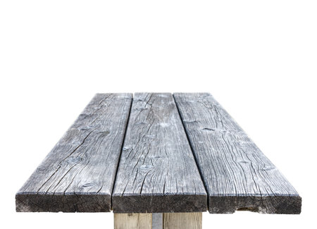 Old empty wooden table isolated on whiteの写真素材