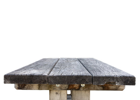 Old empty wooden table isolated on whiteの写真素材