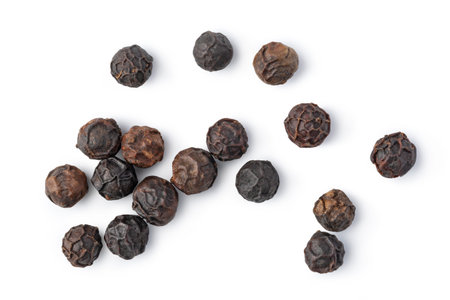 Black peppercorn (Black pepper) seeds isolated on white background