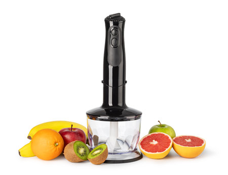 Hand blender and fresh fruits isolated on white backgroundの写真素材