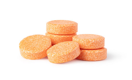 Close-up of orange effervescent tablets vitamins C or painkillers, providing relief and nutritionの写真素材
