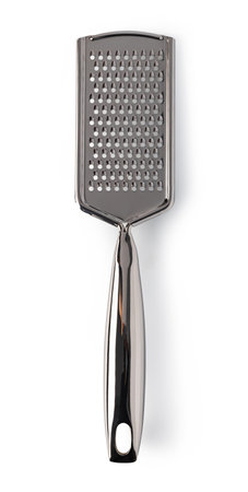 Metal grater with handle isolated on white background, kitchen utensil for grating cheese, vegetables and spicesの写真素材