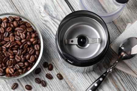Electric Coffee Grinder with fresh coffee beansの写真素材