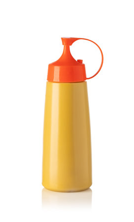 Plastic squeeze bottle ideal for sauces, condiments, dressings, or other liquids, featuring an orange cap and a white backgroundの写真素材