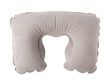 Inflatable travel pillow isolated on white, offering support and comfort on the goの写真素材