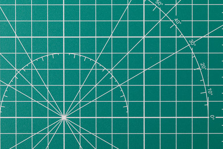 Self-healing cutting mat displaying a precise grid and angle measurements for crafts