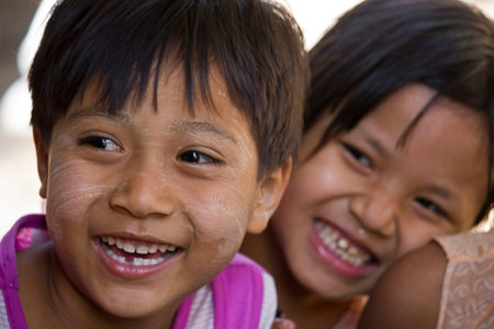 Asiatic Children smiling  Image taken in a little village in myanmar  Burma   Two little girl smile のeditorial素材
