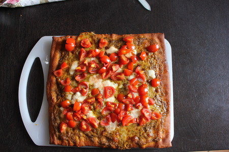Italian Homemade Pesto and Tomatoes Pizza の写真素材
