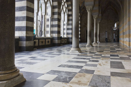 Amalfi, Italy, August 11, 2014: Amalfi Cathedral  (it.Duomo di Amalfi), external colonnade. The church is dedicated to the Apostle Saint Andrew. Predominantly of Arab-Norman Romanesque architectural styleのeditorial素材