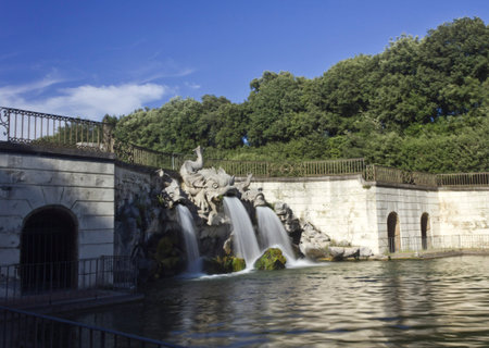 Caserta, Italy, August 14, 2014: Caserta Royal Palace garden. The park is a typical exemplar of the Italian garden, landscaped with vast fields, flower beds and, above all, a triumph of ?water games? or dancing fountainsのeditorial素材