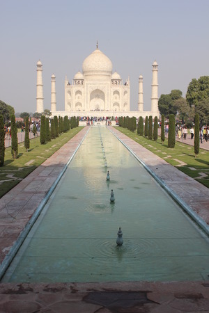 Agra, India: The Taj Mahal, a white marble mausoleum located in Agra, Uttar Pradesh, India. The Taj Mahal is widely recognized as the jewel of Muslim art in India and one of the universally admired masterpieces of the worldのeditorial素材