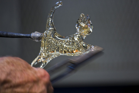 Murano, Italy: An artisan at work making glass sculptureの写真素材