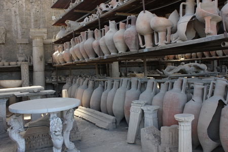 Pompei, Italy: Pompei roman amphoras and petrified body in the forum of the ancient city of Pompeiのeditorial素材